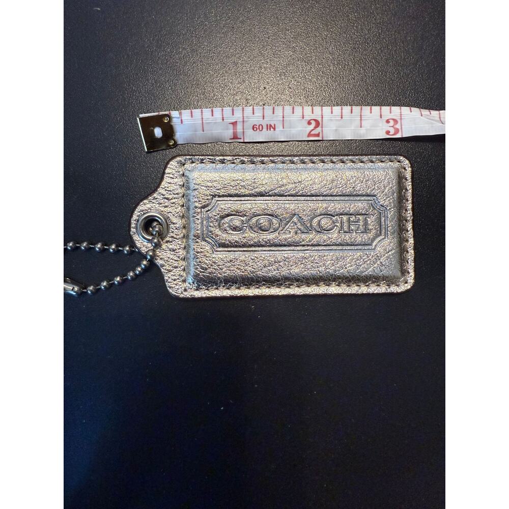 COACH Creed XL hangtag metallic
